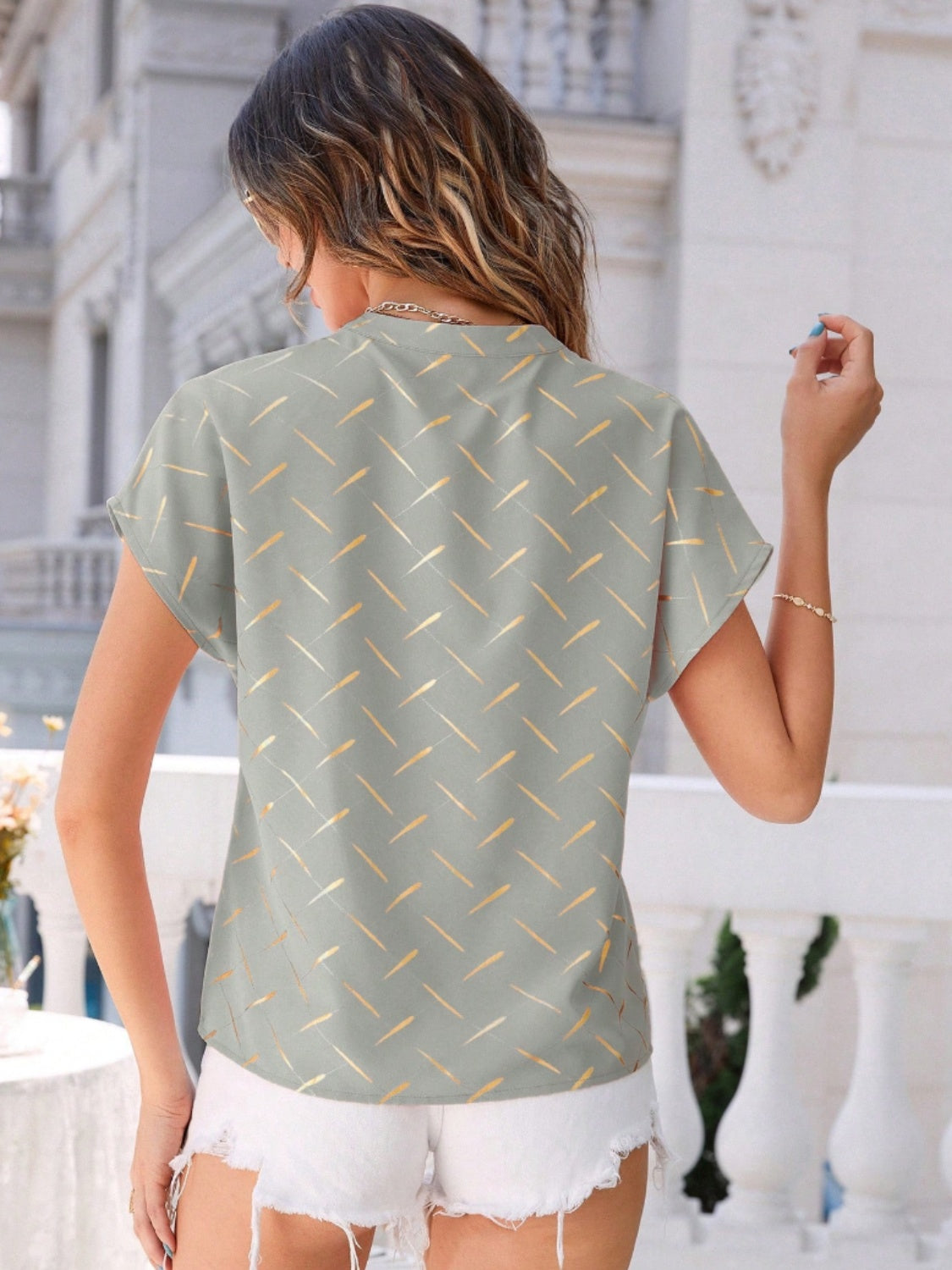 Printed Notched Short Sleeve Blouse in Size S, M, or L